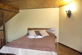 Мини-отель Smotrytska Vezha Каменец-Подольский Двухуровневый люкс-12